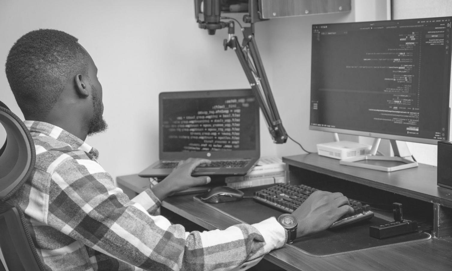 Instructor preparing lecture materials for a Python session